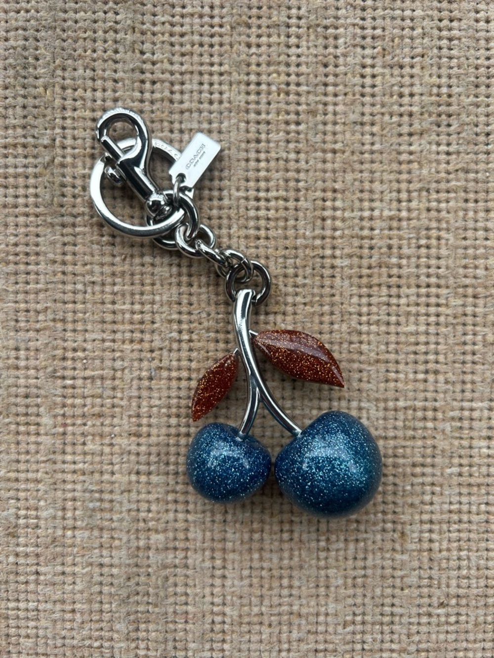 Coach Glitter Cherry Bag Charm in Blue and Copper